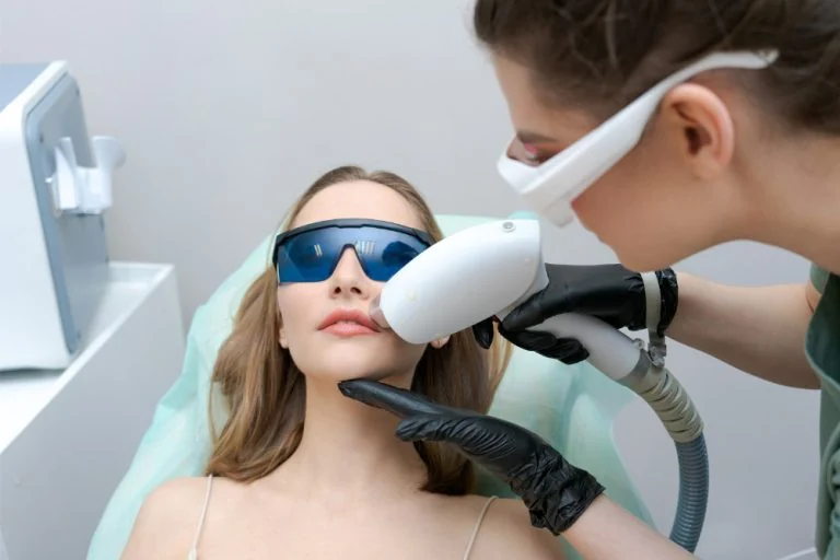 Laser hair removal treatment with eye protection